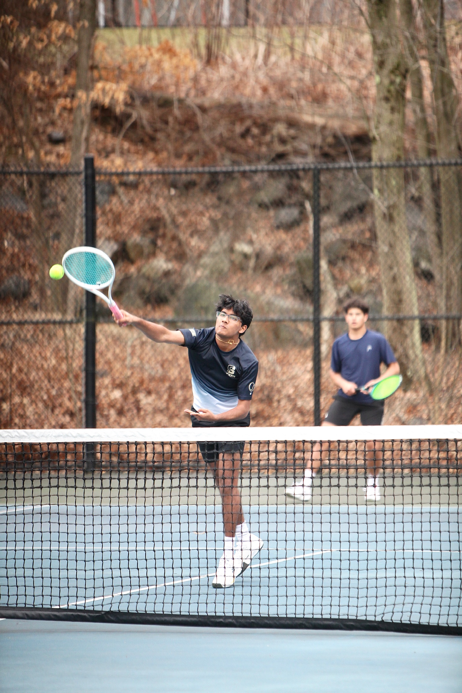 Tennis doubles action shot